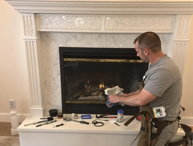 Waterbury Chimney Sweep performing fireplace maintenance in Waterbury, CT